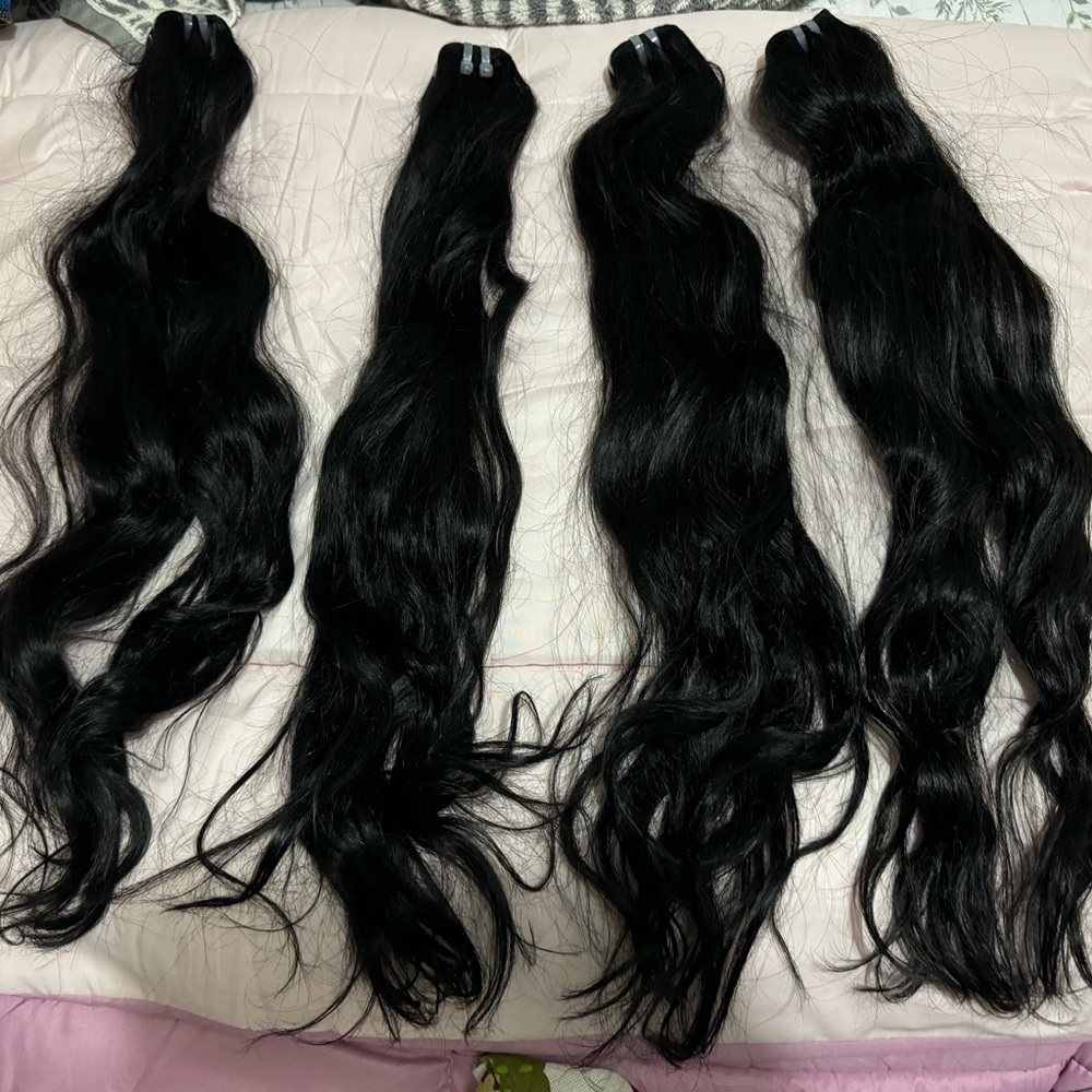 Real human hair extensions 24 inches each. 4 bundles